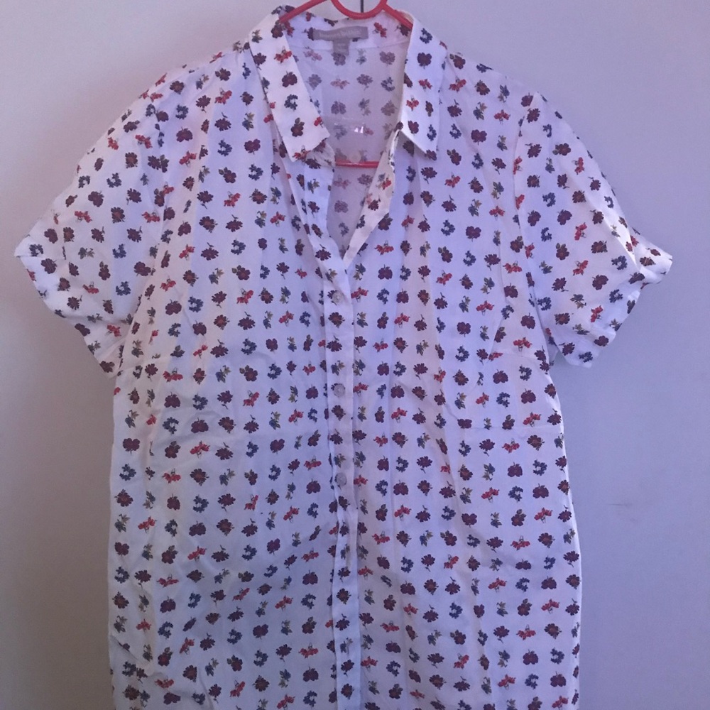 Woman within button down floral shirt 18